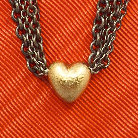 Ole Lynggaard, Heart clasp of 14k gold, with oxidized silver chain Ole Lynggaard, Heart clasp of 14k gold, with oxidized silver chain